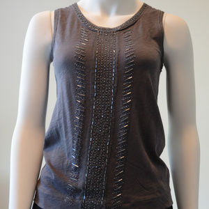 super cute top with embellishments in front